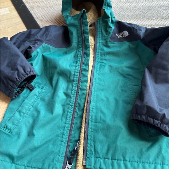 The North Face Kids Teal and Black Raincoat - Picture 1 of 3
